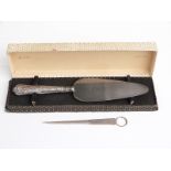 Hallmarked silver-handled cake slice and a plated letter opener