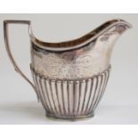 Victorian hallmarked silver cream jug with reeded decoration,