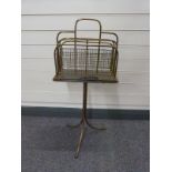 A 19th / early 20thC brass music stand / pedestal magazine rack impressed WT & Co to base H84cm