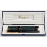 Waterman Ideal fountain and ballpoint pen set with green marbled barrels and caps and gold plated