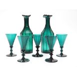 A blue glass drinking set comprising two cut glass decanters, 14.
