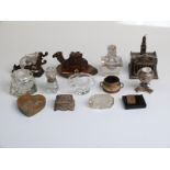 Collection of inkwells including glass Bonzo dog, novelty camel,