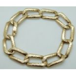 A 9ct gold bracelet made up of elongated links,