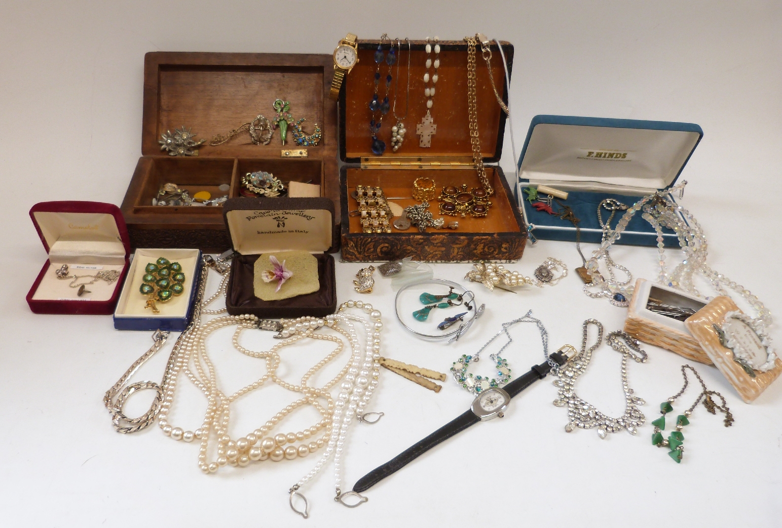 A collection of costume jewellery to include crystal and silver and diamante necklaces, RAF brooch,