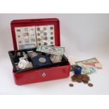 A collection of coins comprising largely UK and USA, some silver, bank notes, modern crowns,