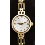 Sekonda 9ct gold ladies wristwatch with gold hands, Roman numerals, baton markers and silver face,