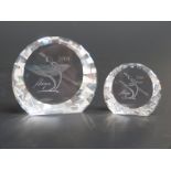 A pair of Swarovski Crystal cut glass signed special event paperweights Antonio,