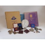 A collection of medal/commemorative coins to include cased Prince Albert colonial exhibition 1886,