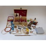 A collection of costume jewellery including rings, gold plated chains, abalone brooch,