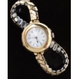 Swiss 15ct gold ladies wristwatch with blued hands, Arabic numerals,