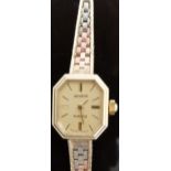 Swiss made 9ct gold ladies wristwatch with gold hands, baton markers, octagonal case and ETA 578.
