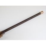 A late 19thC 20thC parasol with plated finial to handle/stick, probably zebra wood,