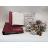 An amateur collection of mostly UK coinage, comprising two albums and categorised containers,
