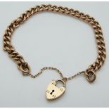 A 9ct rose gold curb link bracelet with heart padlock clasp, 11.