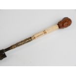 Victorian/Edwardian parasol with intricately carved wooden bust handle, possibly Asian/Oriental,