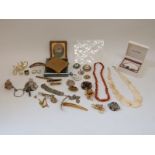 A collection of costume jewellery including Victorian brooches, locket, cameo brooch,