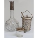Hallmarked silver mounted cut glass decanter,