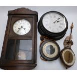 Early 20thC oak cased two train wall clock together with three further wall clocks to include a