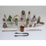 Five hallmarked silver mounted dressing table bottles, green glass scent bottle,