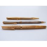 Waterman Moire gold plated fountain pen with 18k gold nib together with a Waterman propelling