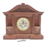 Late 19thC carved wooden mantel clock, the enamelled Roman dial with gilt bezels,