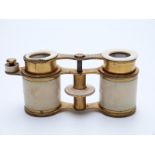 A pair of 19thC G & C Dixey ivory and gilt metal opera glasses marked 'Opticians to His Majesty,