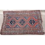 Persian Koliai style rug with three octagonal guls, the central most featuring stylized fish,
