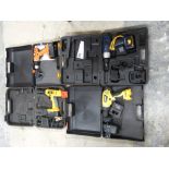 Four boxed cordless drills