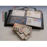 A collection of first day covers and stamps