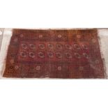 Turkoman Bokhara rug with sixteen octagonal guls surrounded by geometric borders,