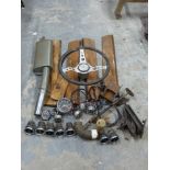 A quantity of Ford Cortina parts including steering wheel, instruments,