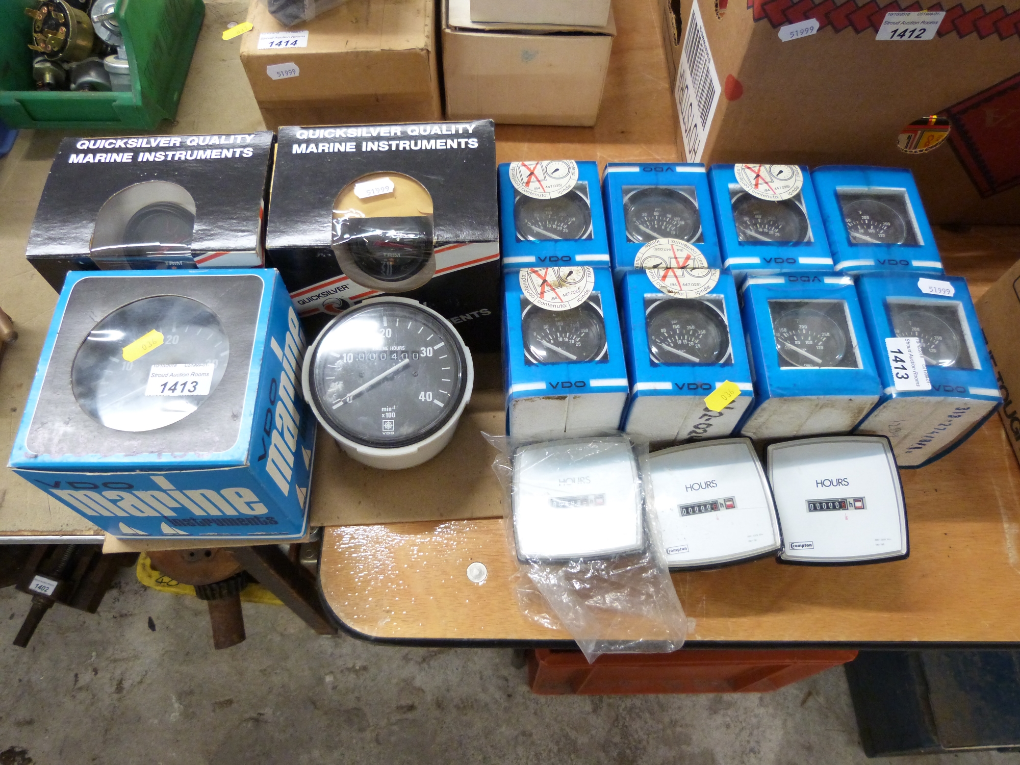A quantity of marine VDO and other instruments including a pair of trim gauges, hour meters,