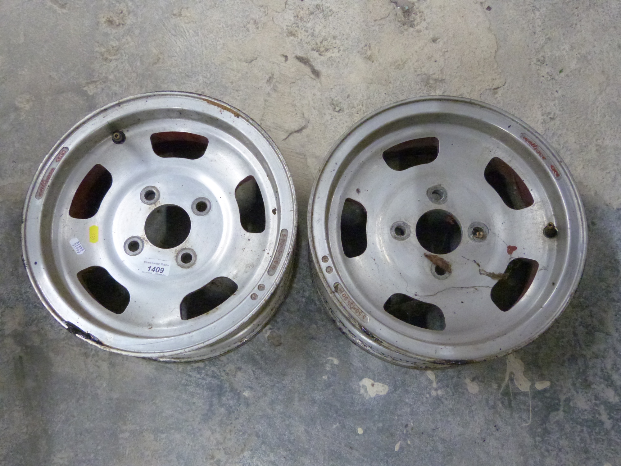 Pair of Wolf Race alloy wheels marked 5.50 x 13 x .