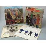 A small case of 16 albums mostly from the 1960s including The Beatles (Pepper, Help, Revolver),