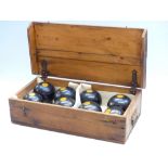 Two sets of E J Riley Ltd lawn bowls