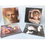 Approximately 20 LPs including six David Bowie (Space Oddity with poster, Heroes, Young America,