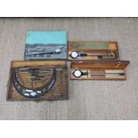 Large cased micrometer set and three bore or similar gauges