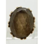 A 9ct gold ring set with a smoky quartz