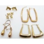 Three 9ct gold earrings (2.7g), a pair of 14ct gold earrings (1g) and a pair of yellow metal