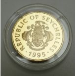 1995 Seychelles gold proof 100 rupees coin to commemorate the Queen Mother's wedding 1923 with