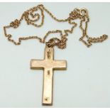 A 9ct rose gold cross and a 9ct gold chain, 3.7g