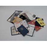 A collection of various coin packs, London Mint commemorative crowns etc