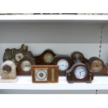 A collection of various small mantel clocks, most mid twentieth century, to include 8 day examples