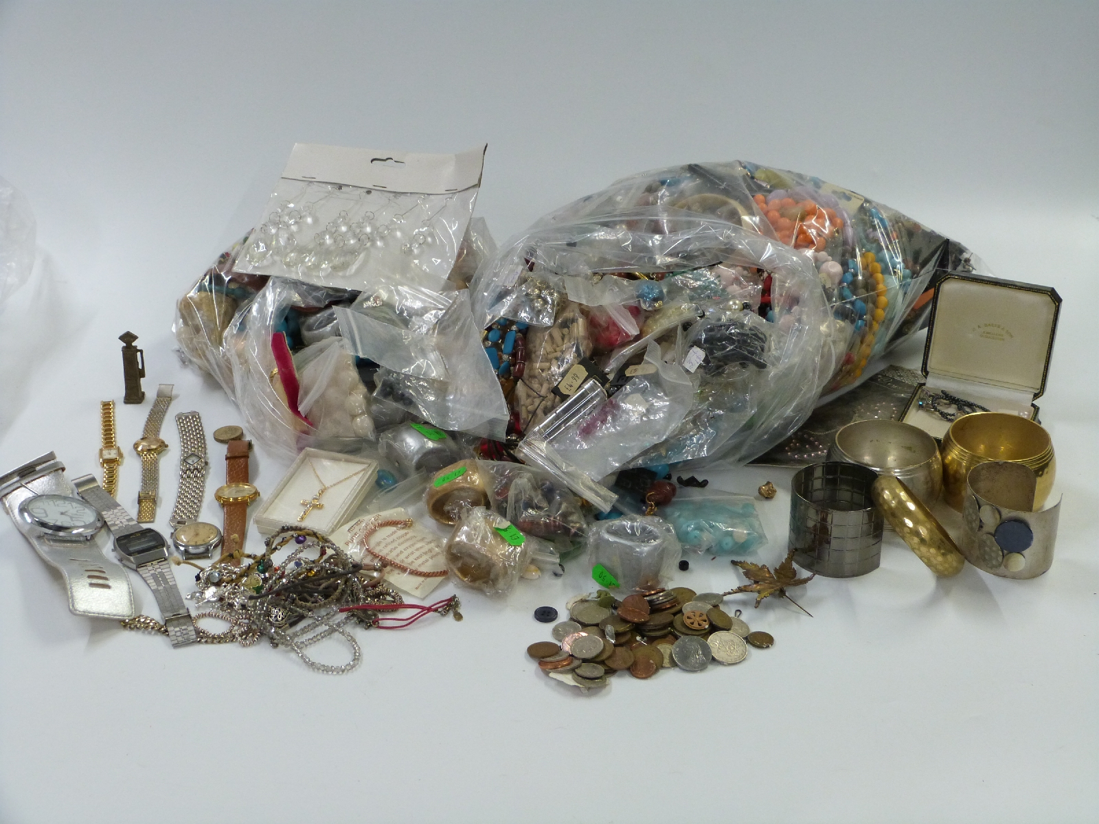 A large collection of costume jewellery including beads, Ingersoll watch, Rotary watch etc