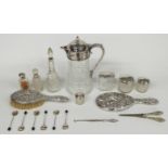 Seven various hallmarked silver mounted dressing table bottles, hallmarked silver mounted hand