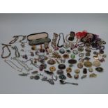 A collection of jewellery including Victorian agate brooch, silver and marcasite brooch, beads,
