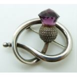 A Charles Horner hallmarked silver brooch depicting a thistle set with purple paste, 3.5 x 2.5cm