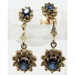 A pair of 9ct gold earrings set with two sapphires and diamonds, 2.5cm drop