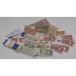 A collection of world/UK banknotes, early 20thC onwards, includes some crisp and uncirculated