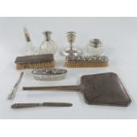 Hallmarked silver mounted items including hand mirror, two books, three dressing table pots or